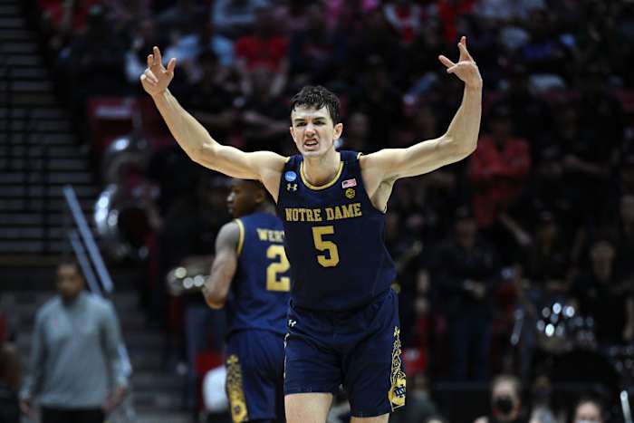 #5 Cormac Ryan celebrates after drilling a three-pointer in the NCAA Tournament